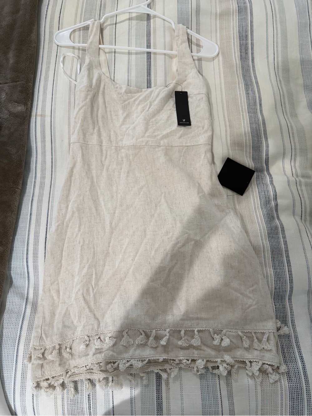 Lulu's Cream Tassel-Hem Tank Mini Dress